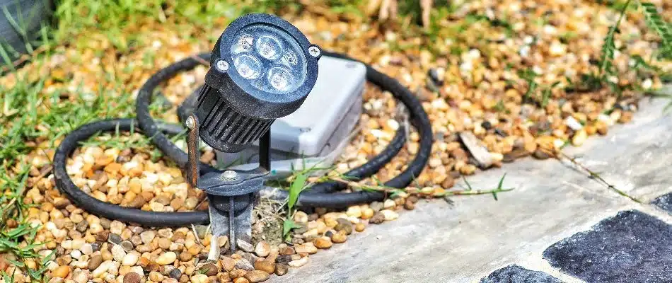 An LED outdoor light installed by a walkway on a property in Kentwood, MI.