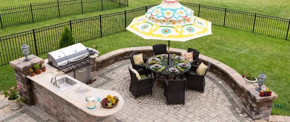 blog outdoor kitchen with seating wall