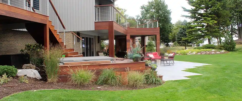 Brown mulch ground covering for landscape bed in Grand Haven, MI.